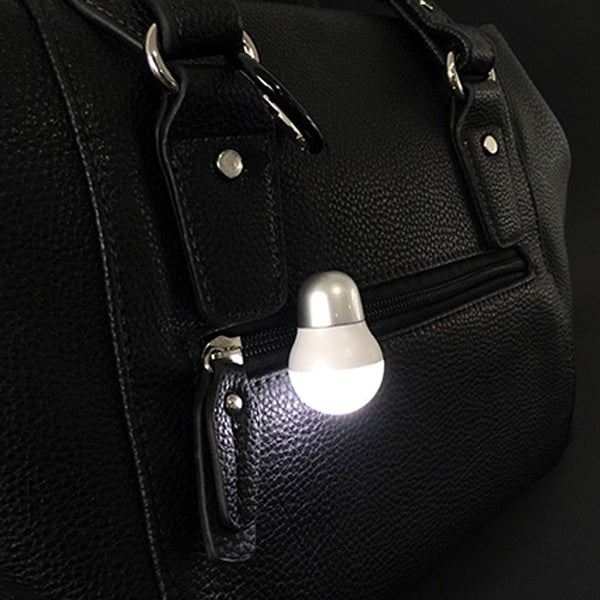Troika Bag Light LED Keychain Lightbulb. Item  TOR22/SI Shown on leather Bag
