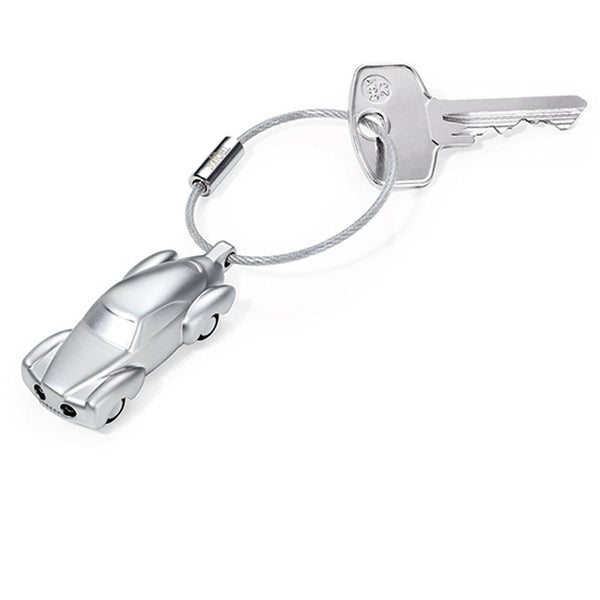 Troika Light Rider, LED Light Keychain in shape of Classic Car Matt Silver. Showing key on nail friendly wire loop. Troika Item KR10-53/MA