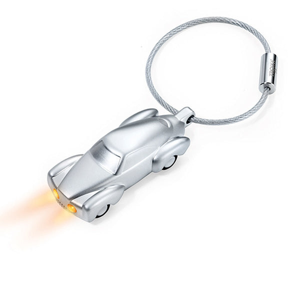 Troika Light Rider, LED Light Keychain in shape of Classic Car Matt Silver with nail friendly wire loop. Showing yellow LED Lights on Troika Item KR10-53/MA