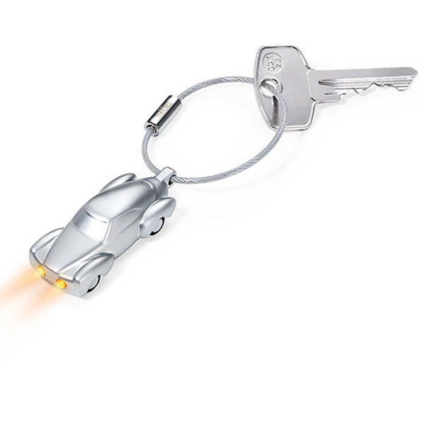 Troika Light Rider, LED Light Keychain in shape of Classic Car Matt Silver. Showing Keyon nail friendly wire loop. Image shows item with Yellow LEDs on Troika Item KR10-53/MA