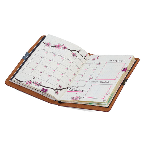 Troika Item BTJ36/BR Refillable Dot Grid A5 Bullet Journal with Leatherette Cover Showing user's bullet journal art