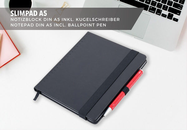 Black Troika notebook with red pen on a white surface, with text about Slimpad A5 notepad and ballpoint pen.