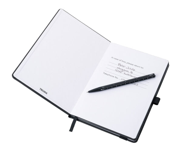 Open Troika A5 notebook with a Troika Basic Construction Pen showing ownership info 